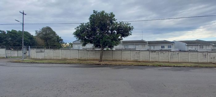 For Sale: Townhouse in Cambridge West with private patio, garage, and secure complex.