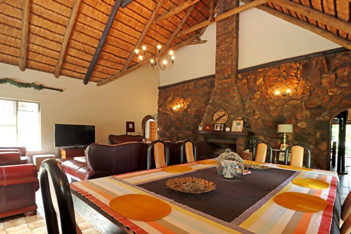 Equestrian estate home with cottages, stables, and ample outdoor space in Randjesfontein AH. For Sale.