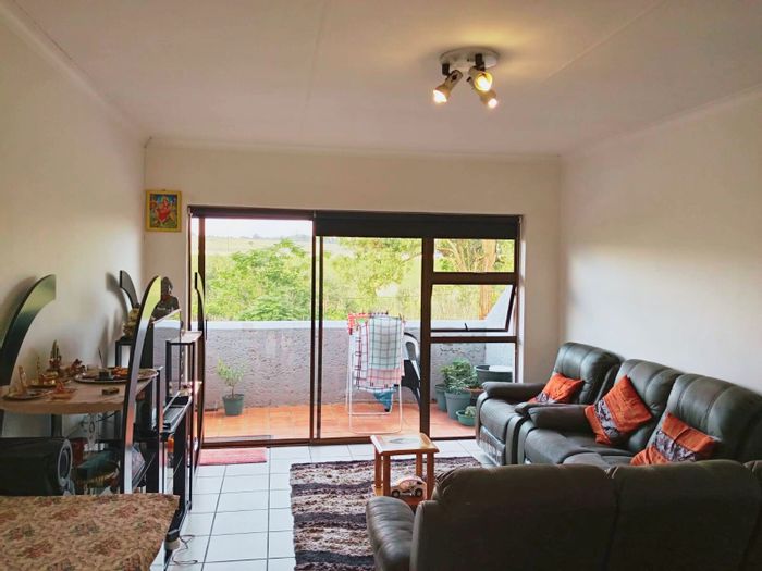 For Sale: Apartment in Buccleuch with clubhouse, pool, and private patio.