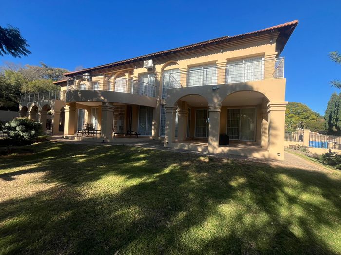 House To Rent in Waterkloof Ridge: Embassy-style security, spacious layout, pool, garden service.