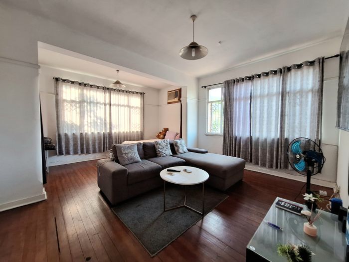 Glenwood Flat For Sale: 1.5 bedrooms, parking, income-generating, near amenities.