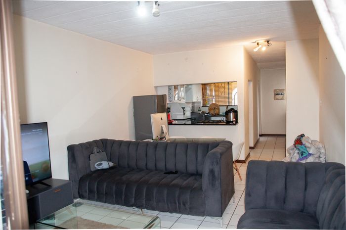 2 Bedroom Apartment For Sale in Buccleuch with garden patio and open-plan living.