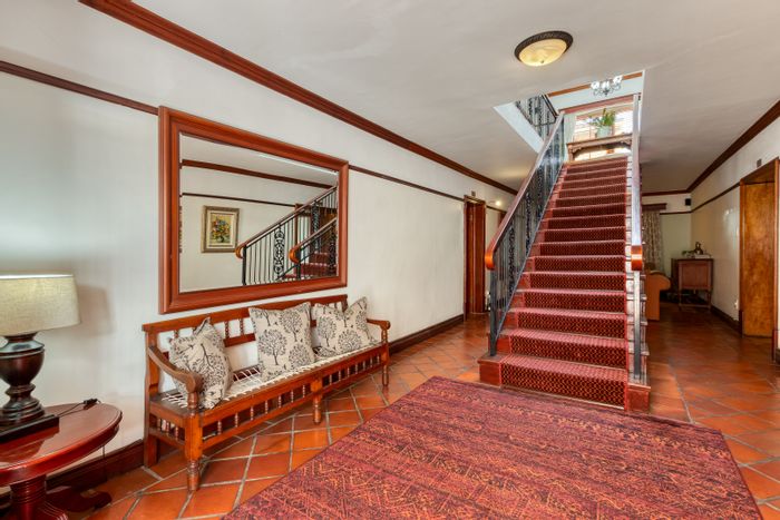 Gordons Bay Village Guest House For Sale: Beachfront, multiple suites, parking, wine cellar.