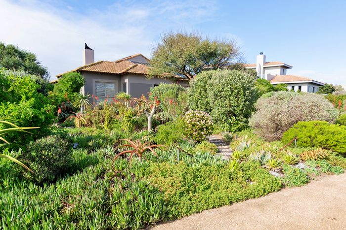 For Sale: House in Langebaan Country Estate with golf views and ample amenities.