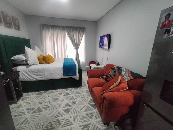 Bachelor flat for sale in Pretoria North with communal amenities and secure parking.