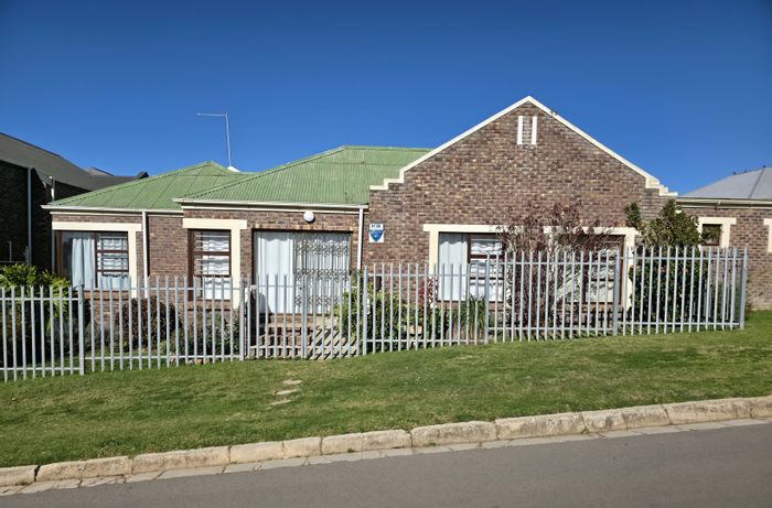 For Sale: House in C Place with garden, double garage, and secure community access.