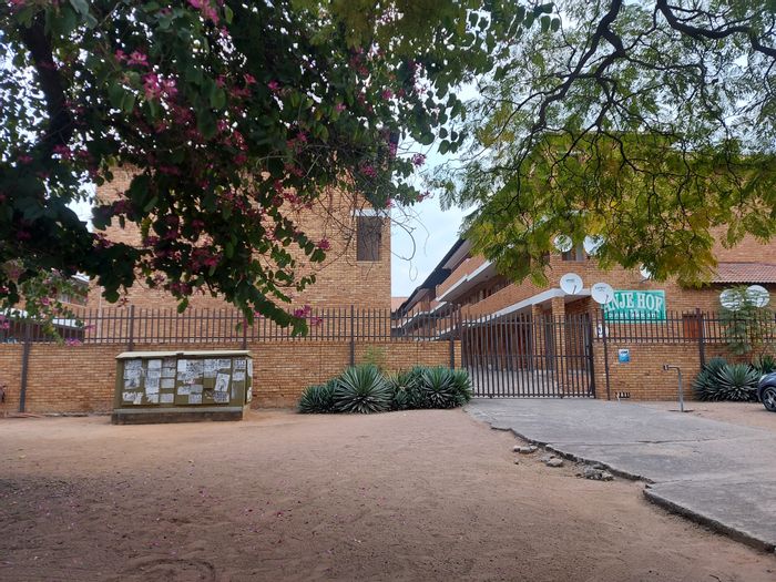 For Sale: 3-Bedroom Apartment in Rustenburg Central with Garage and Visitor Parking.