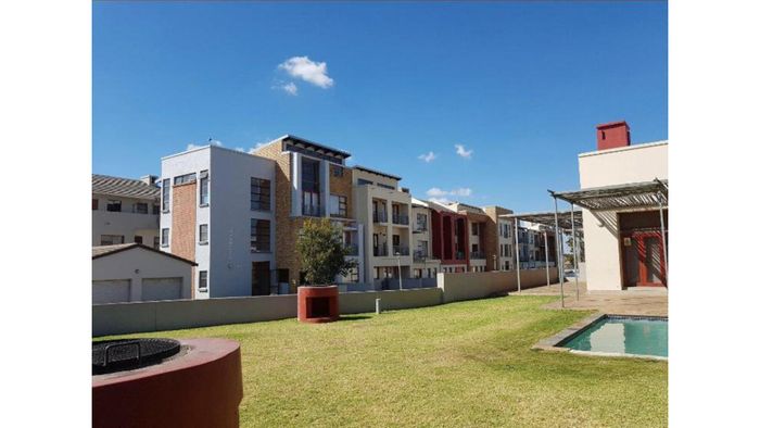 For Sale: Apartment in Noordwyk with clubhouse, pool, squash court, and playground.