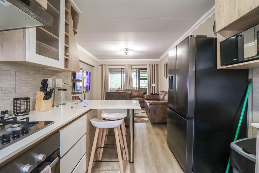 Open plan lounge/dining/kitchen areas