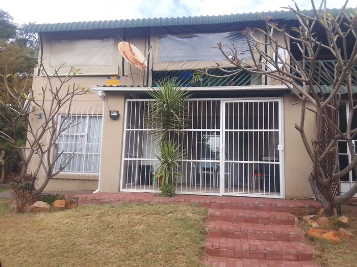 For Sale: Townhouse in Safari Gardens with pool, garden, and secure living.