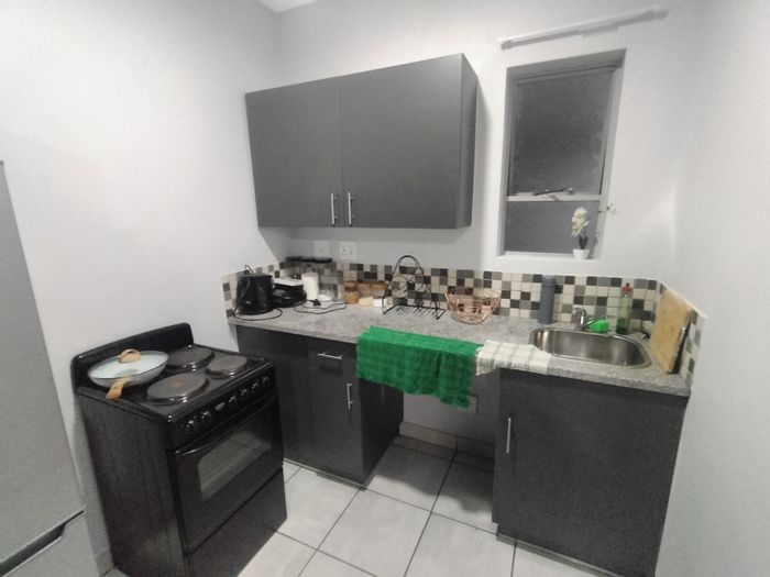Flat for Sale in Pretoria North: Secure complex, rooftop braai, close to transport.