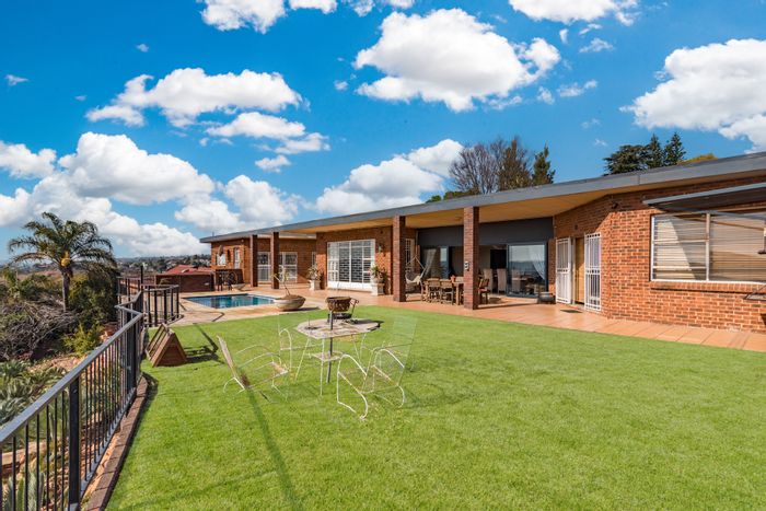 For Sale: Rangeview House with 3 Bedrooms, Granny Cottage, Heated Pool, and Workshop.