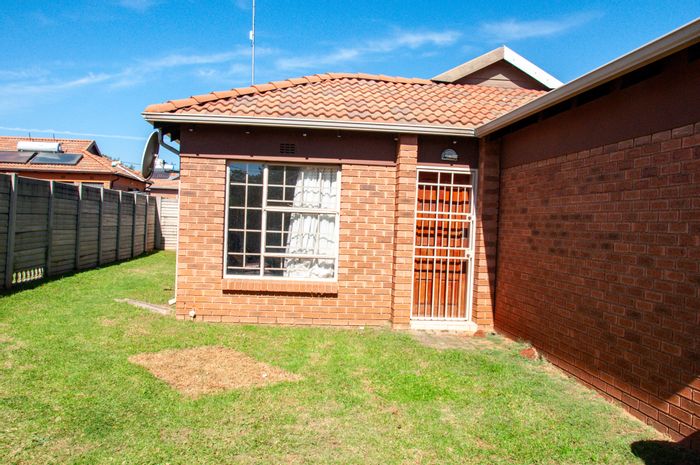 For Sale: Clayville Townhouse with 3 beds, garden, garage, and solar geyser.