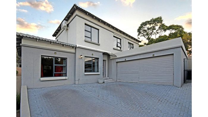 Spacious Magaliessig townhouse with large garden, backup power, and pet-friendly amenities. For Sale.