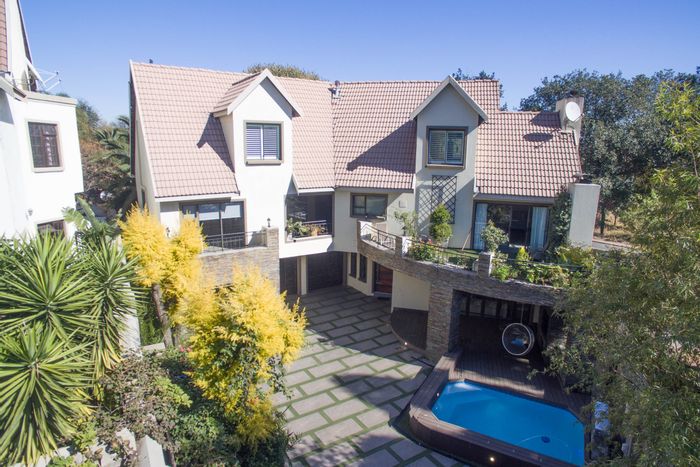 4-Bedroom House To Rent in Bedfordview Central with pool, garages, and entertainment area.