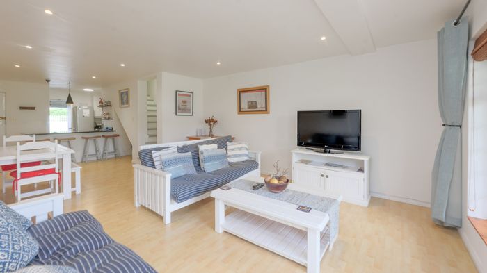 For Sale: Apartment in Struisbaai Central with pool, patio, and built-in braai.