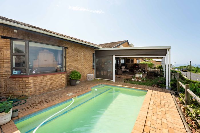 For Sale: Townhouse in Athlone Park with pool, sea views, and double garage.