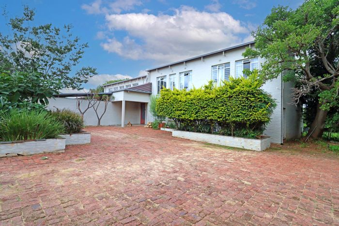 Equestrian estate for sale in Sun Valley with cottages, pool, and security features.