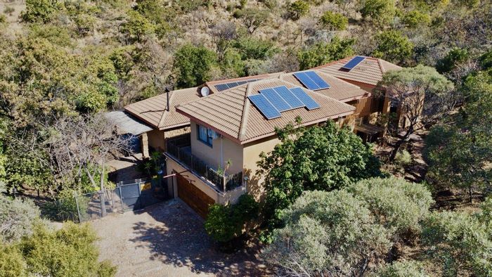 For Sale: House in Waterkloof AH with solar power, borehole, and eco estate living.