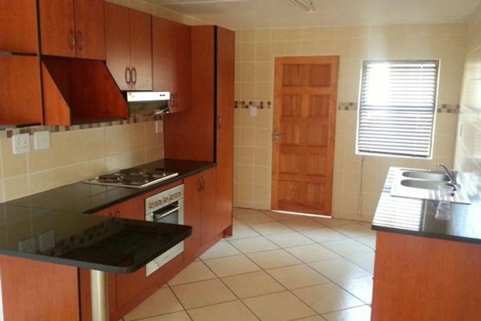 For Sale: Ground Floor Flat in Noordrand, 2 Bedrooms, Secure Parking, Open Plan Living.