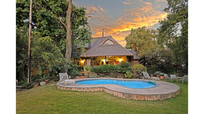 For Sale: Spacious Sun Valley house with pool, stables, and staff quarters.