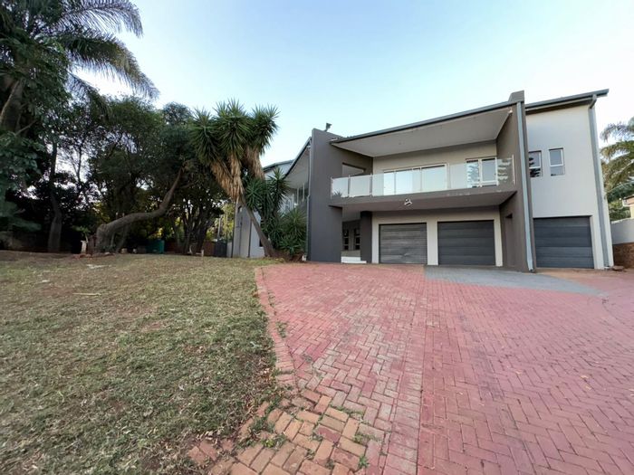 Spacious 6-bedroom house in Safari Gardens, featuring outdoor entertainment and pool. For Sale.