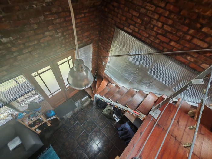 Unique South End Apartment For Sale: Loft-style, spacious, with parking and vibrant amenities.