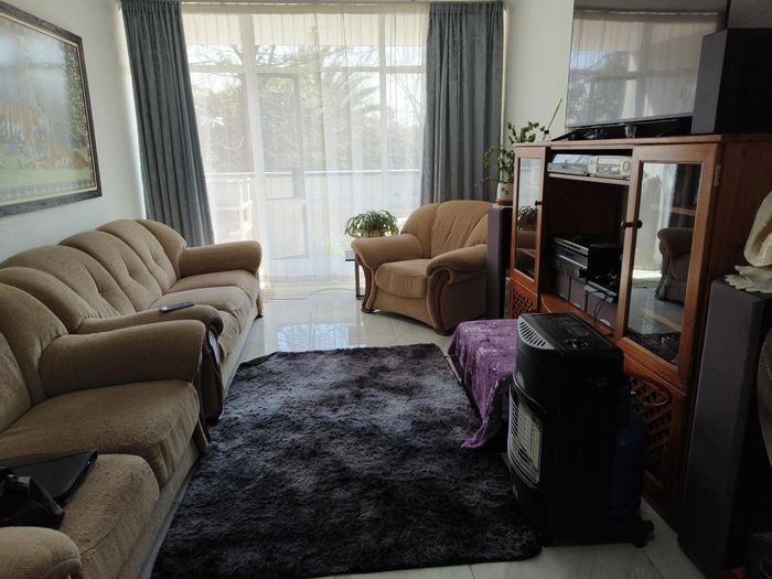 For Sale: Flat in Edenvale Central with 2 bedrooms, security features, and parking.