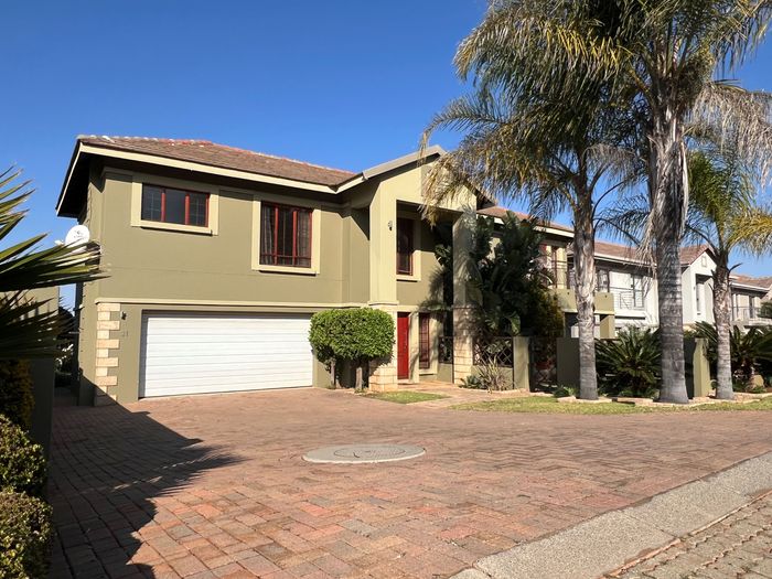 3-Bedroom Townhouse To Rent in Wilkoppies with secure estate, double garage, and backyard.