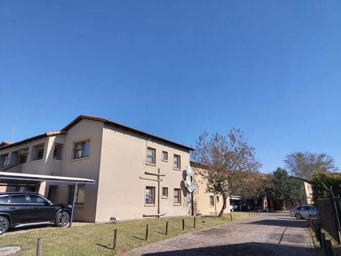 For Sale: 2-Bedroom Apartment in Waterval East with secure living and communal garden.