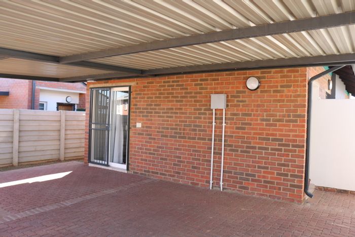 For Sale: House in Parkdene with garden, solar geyser, and secure complex.