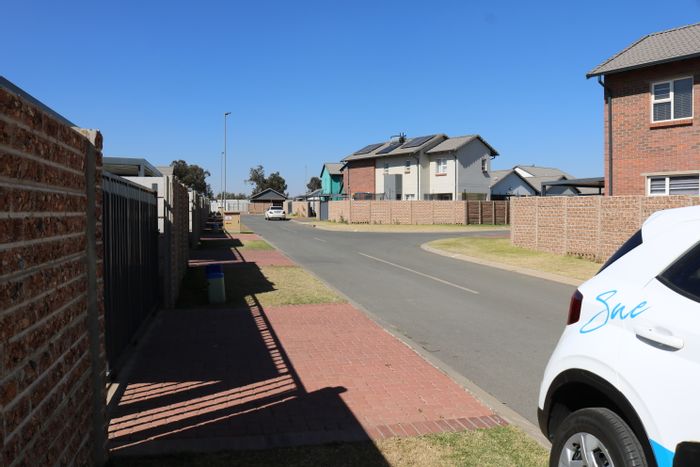 For Sale: House in Parkdene with garden, solar geyser, and secure complex.