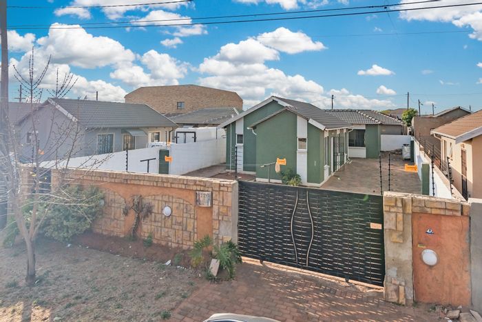 3-Bedroom House For Sale in Protea Glen with rental potential and secure yard.