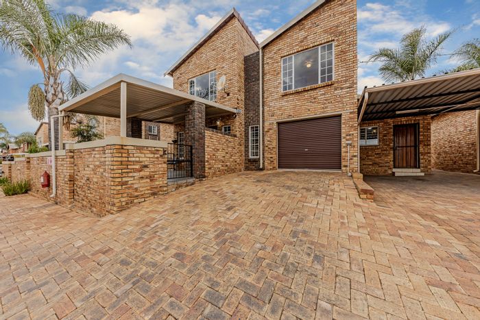 For Sale: Willowbrook Townhouse with pool, braai area, and spacious living.