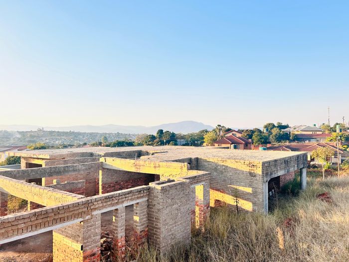 Elim House For Sale: Corner lot, 3 bedrooms, double garages, potential for expansion.