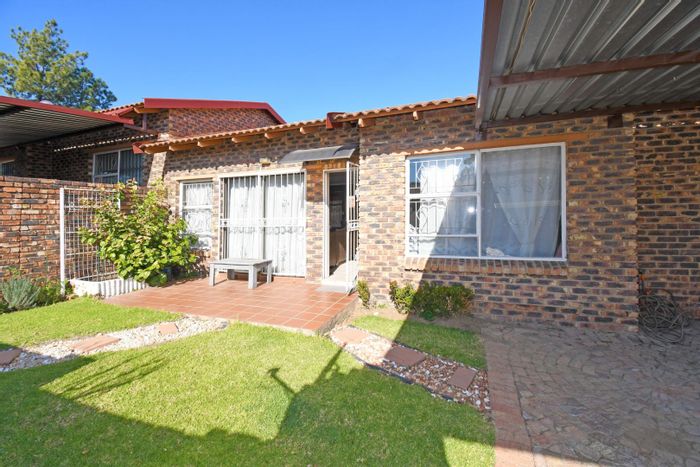 For Sale: Buccleuch Townhouse with 3 bedrooms, courtyard, and covered parking.