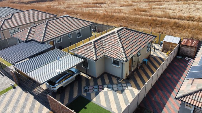 3-Bedroom House in Andeon For Sale with Carports and Communal Playground Access.