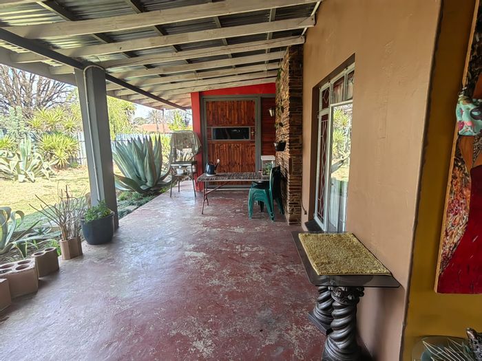 For Sale: House in Parys Central with rental flats, large patio, and water tank.