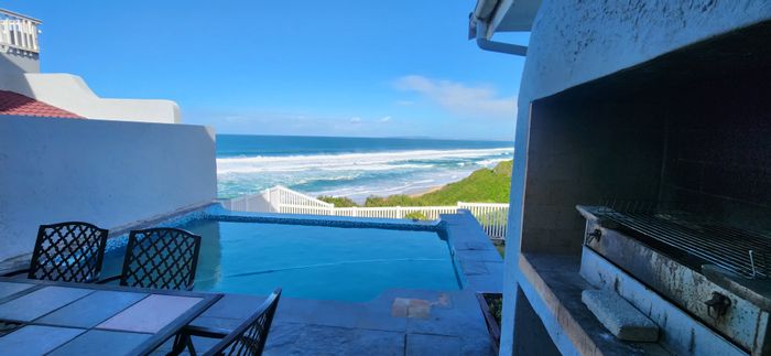 For Sale: Dana Bay house with ocean views, pool, and spacious living areas.