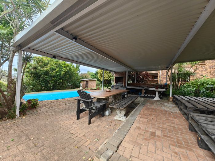 Spacious 7-bedroom house in Pennington Central with pool, flatlets, and ample parking. For Sale.