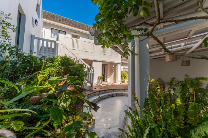 For Sale: Guest House in St Francis On Sea with 5 units, beach access, and strong income.