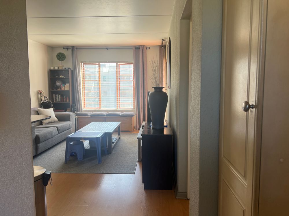 The entrance hall has a cupboard and small study nook