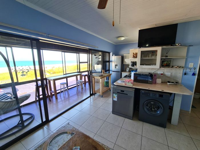 For Sale: Apartment in Jeffreys Bay Central with sea views, braai balcony, and parking.
