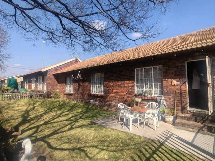 For Sale: House in Nigel Central with multiple rental units and secure parking.