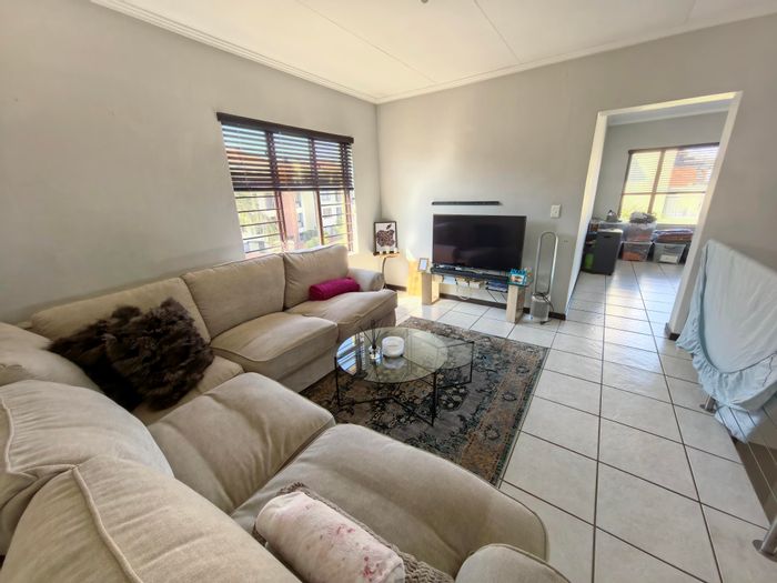 For Sale: Apartment in Sunninghill with pool, gym, and spacious sky patio.