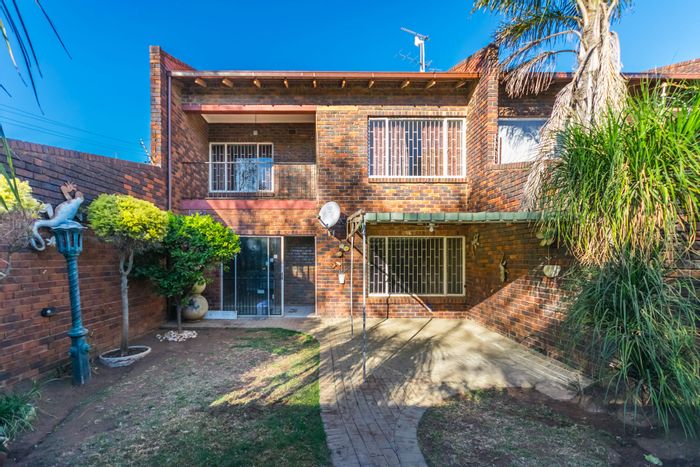 For Sale: Spacious Greenhills townhouse with 4 bedrooms, private garden, and double garages.