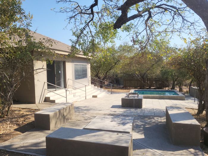 For Sale: House in Marloth Park Central with pool, en-suite bedrooms, and wildlife views.