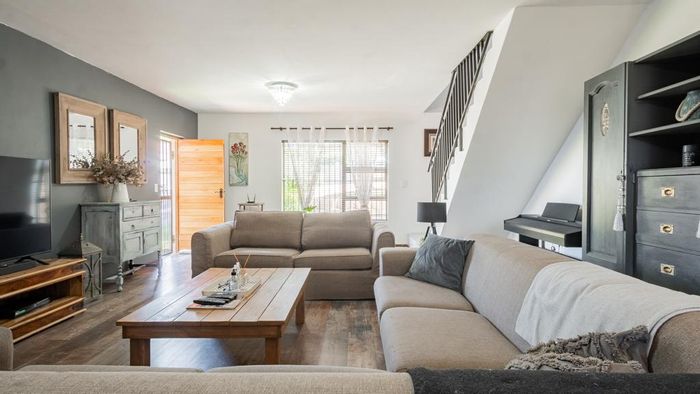 For Sale: Spacious Protea Heights house with separate flat, gardens, and ample parking.