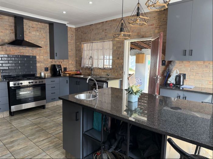 For Sale: House in Parkrand with 3 bedrooms, pool, and spacious garden.
