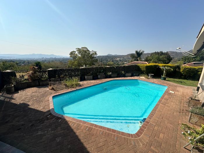 For Sale: House in West Acres Ext 6 with pool, double garages, and air-conditioning.